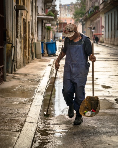 Street cleaner in old Havana going about his day.